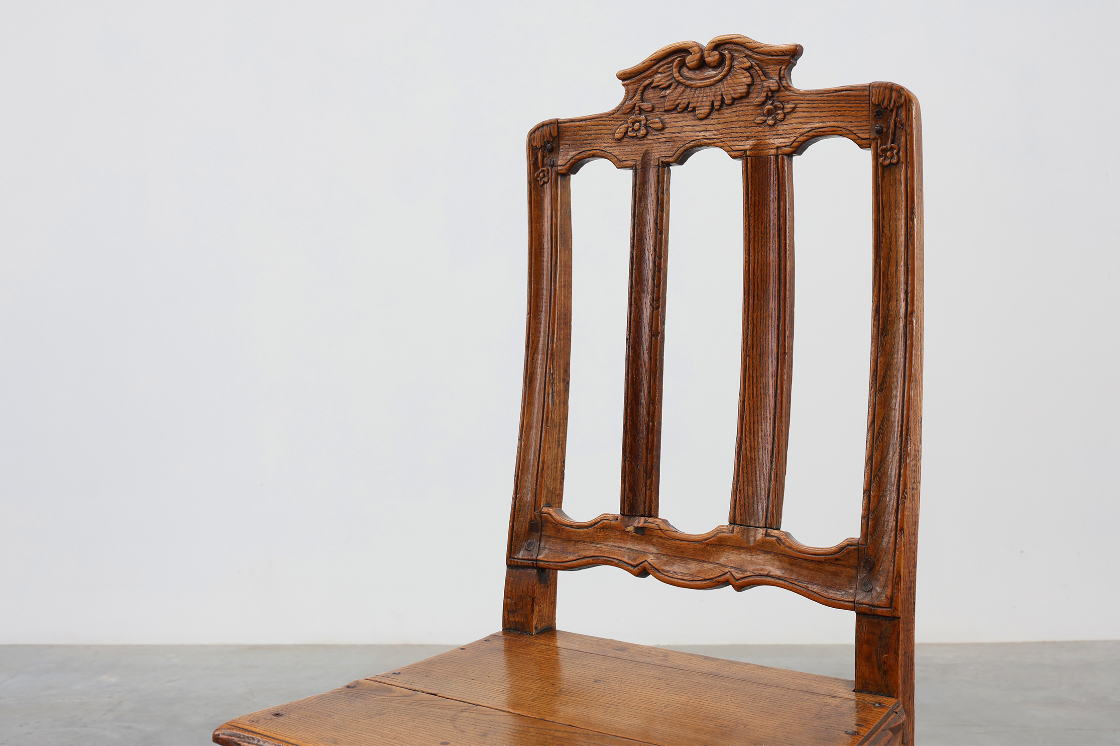 Pair of Antique carved oak side chairs, France 18th century thumbnail